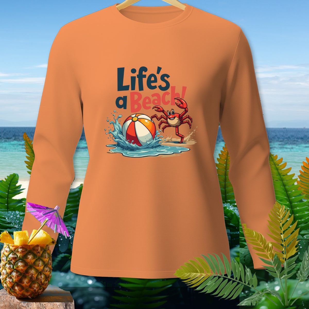 Orange long sleeve shirt with graphic "Life's a Beach!" and cartoon crab.