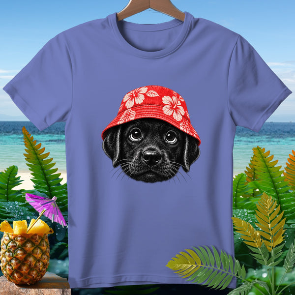 Purple t-shirt with a black puppy wearing a red floral bucket hat.
