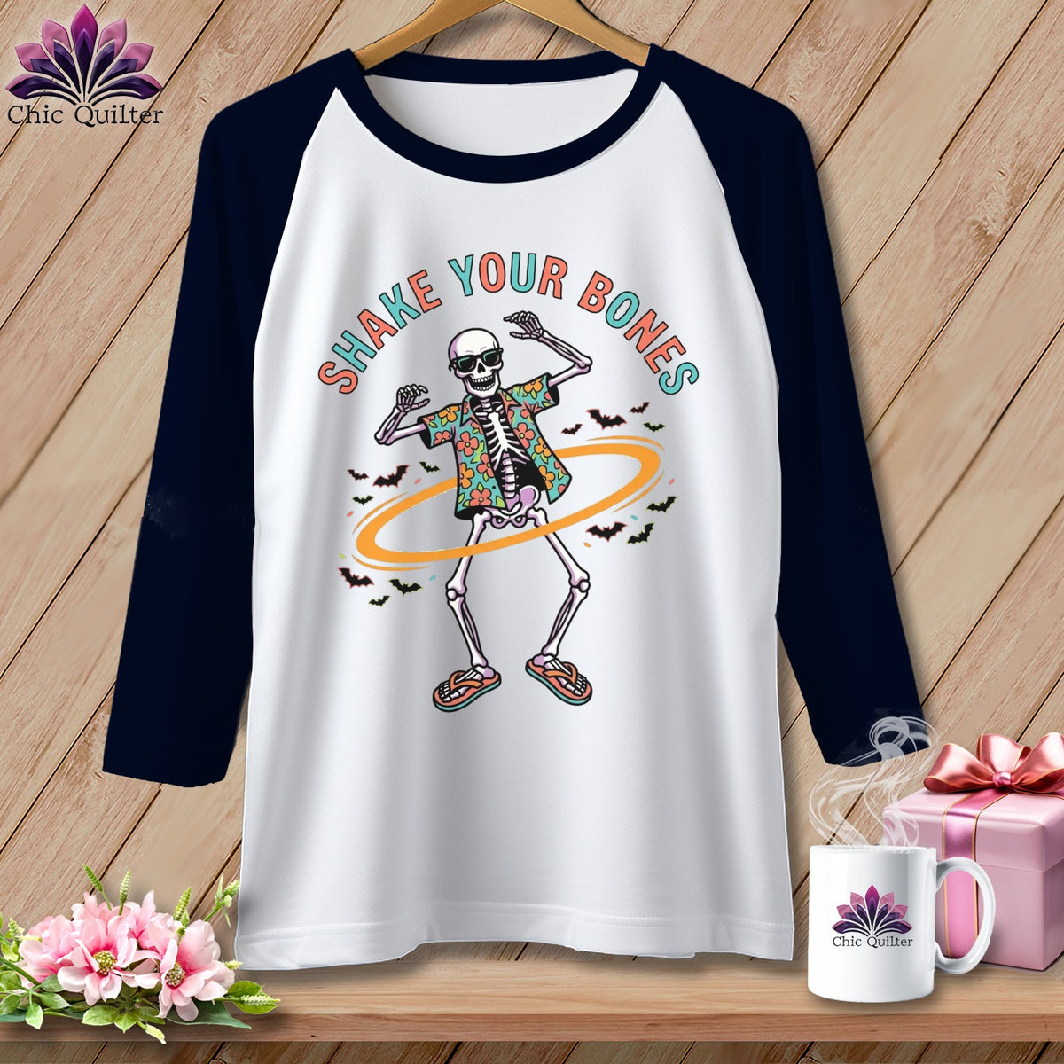 T-shirt with a dancing skeleton graphic and the text "SHAKE YOUR BONES".