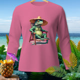 Pink long-sleeve shirt with a green iguana wearing a straw hat relaxing in a beach chair.