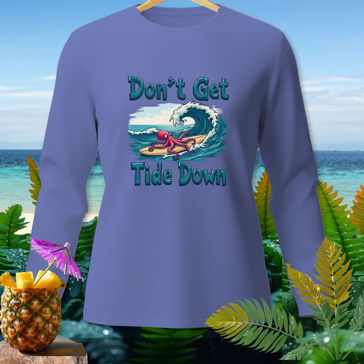 Purple long-sleeve shirt with "Don't Get Tide Down" and surfing octopus graphic.