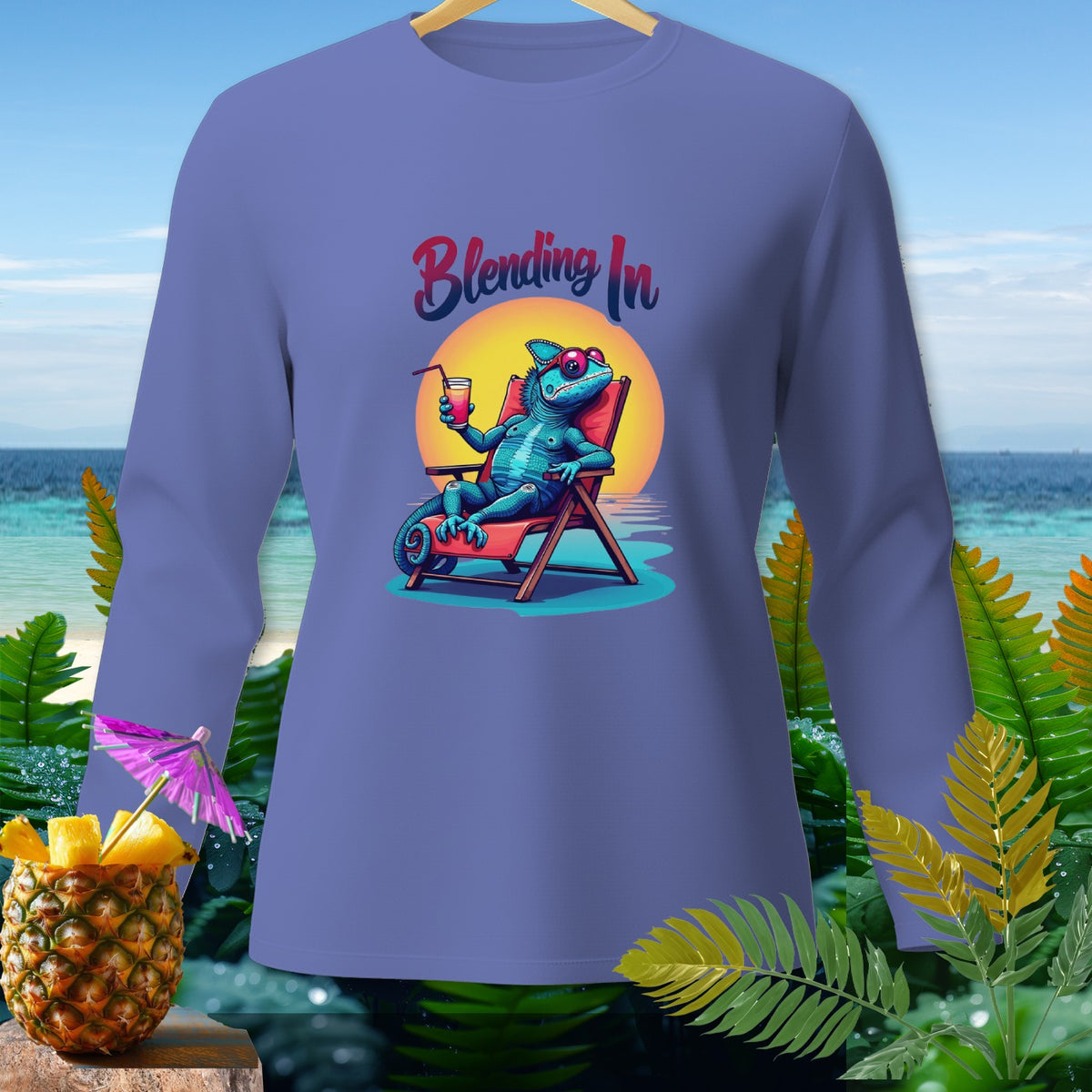 Long sleeve shirt with a blue chameleon relaxing in a beach chair, text "Blending In".