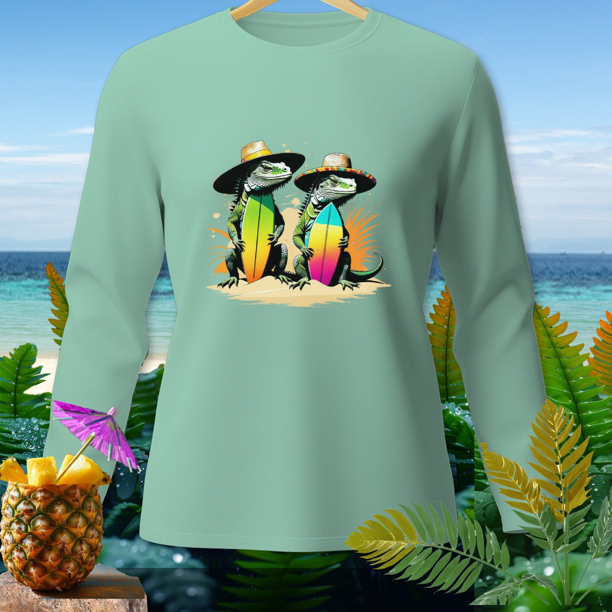 Light green long-sleeve shirt with two iguanas in hats holding surfboards.