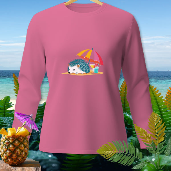 Pink long-sleeve shirt with a graphic of a hedgehog on a beach under an umbrella.