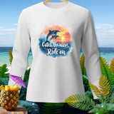 White long-sleeved shirt with dolphins jumping at sunset and text 