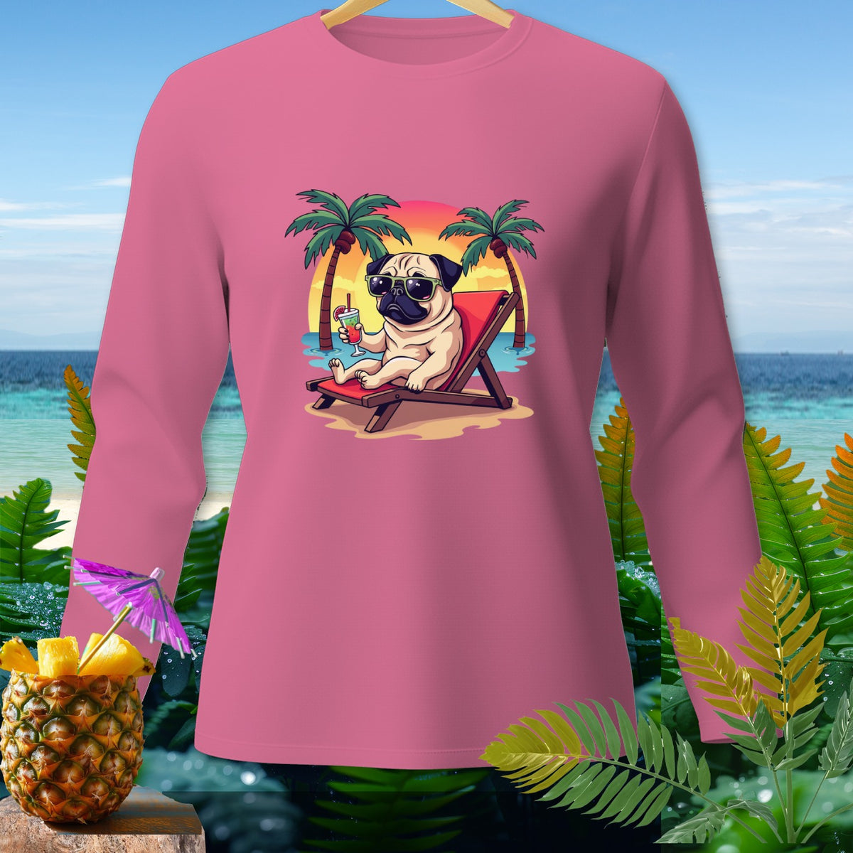 Pink long-sleeved shirt with a pug on a beach chair, holding a drink.