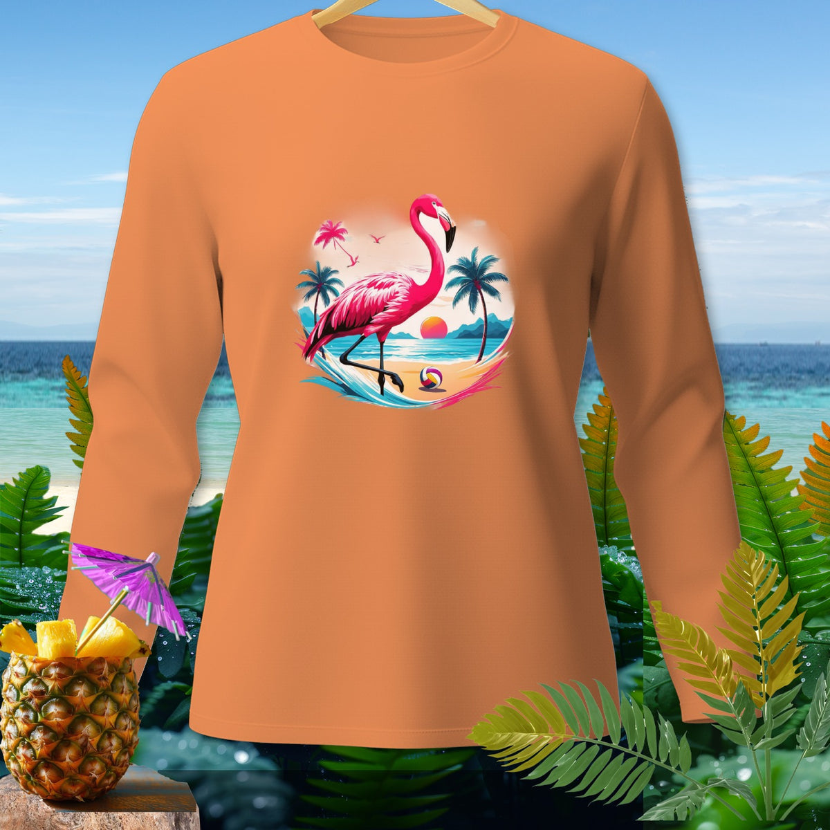 Orange long-sleeve shirt with a graphic of a flamingo on a tropical beach.