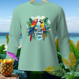 Light blue long-sleeve shirt with two macaws and text 