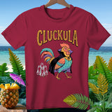 Maroon t-shirt with cartoon vampire rooster and ghosts, text 