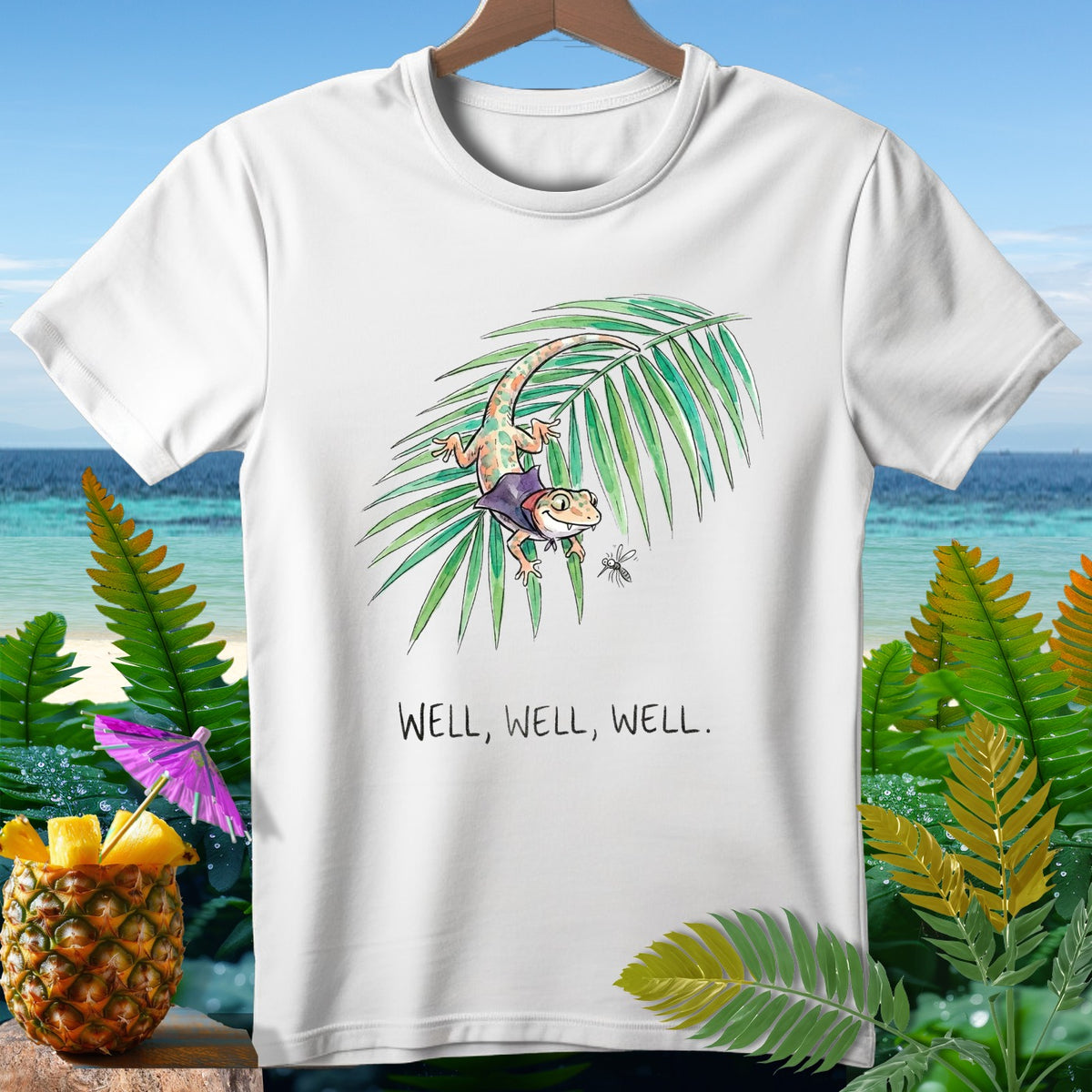 White t-shirt with cartoon gecko, palm frond, mosquito, and text "WELL, WELL, WELL."