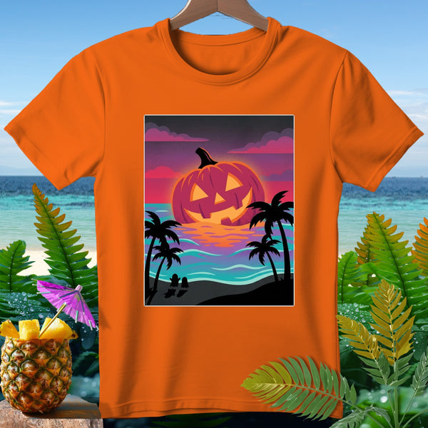Orange t-shirt with a jack-o'-lantern on a beach at sunset graphic.