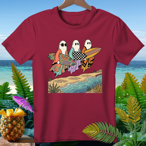 Three ghosts with surfboards walk on a beach with the text "BOO CREW".