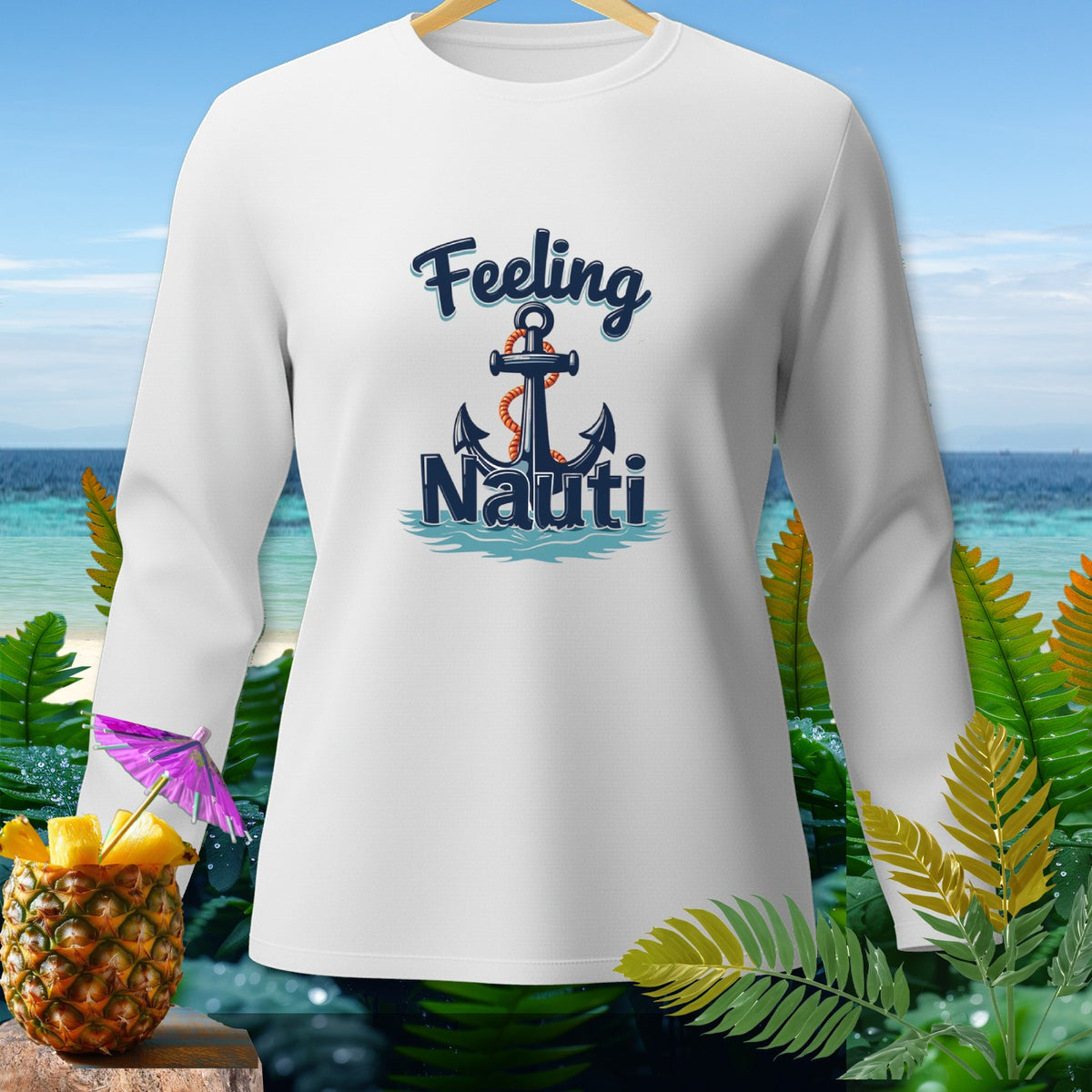 White long sleeve shirt with "Feeling Nauti" and anchor graphic on beach background.