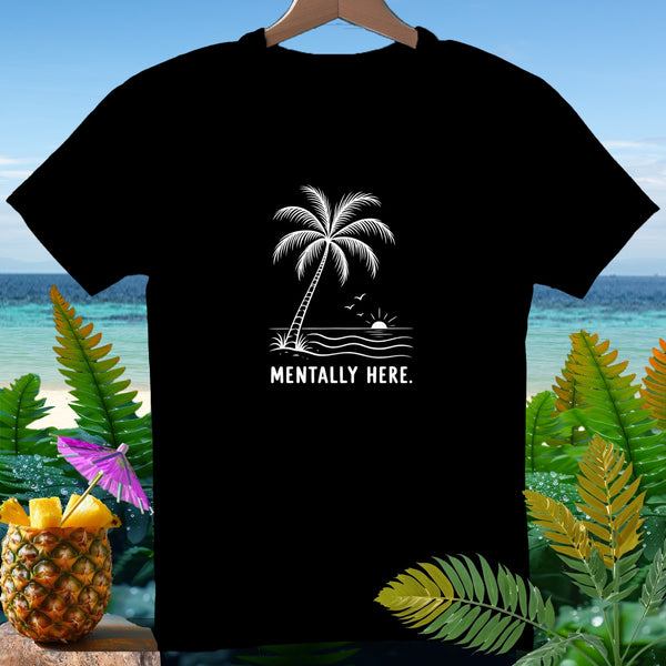 Black t-shirt with white graphic of palm tree, ocean, and text "MENTALLY HERE."