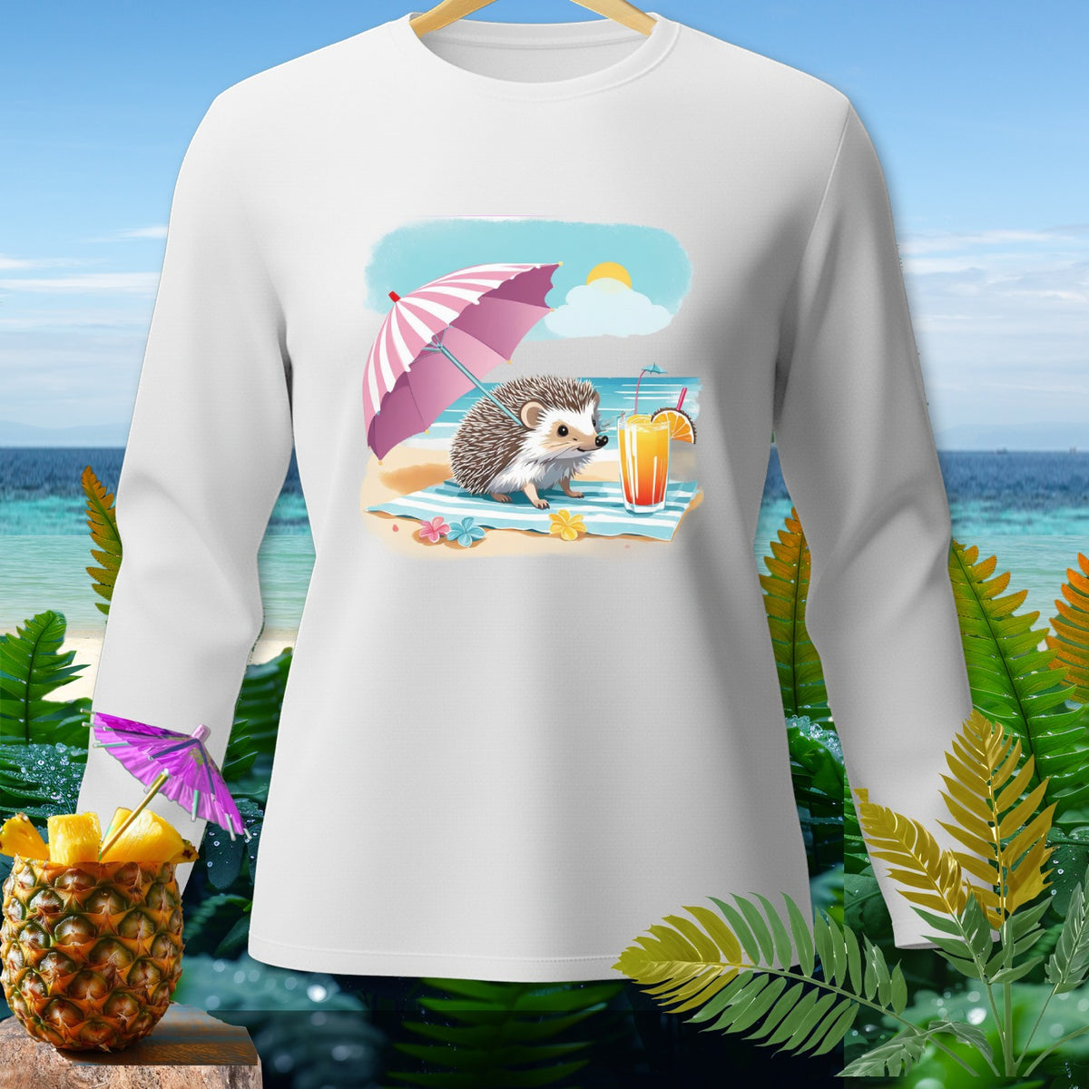 Long sleeve white shirt with a cute hedgehog on a beach under an umbrella.