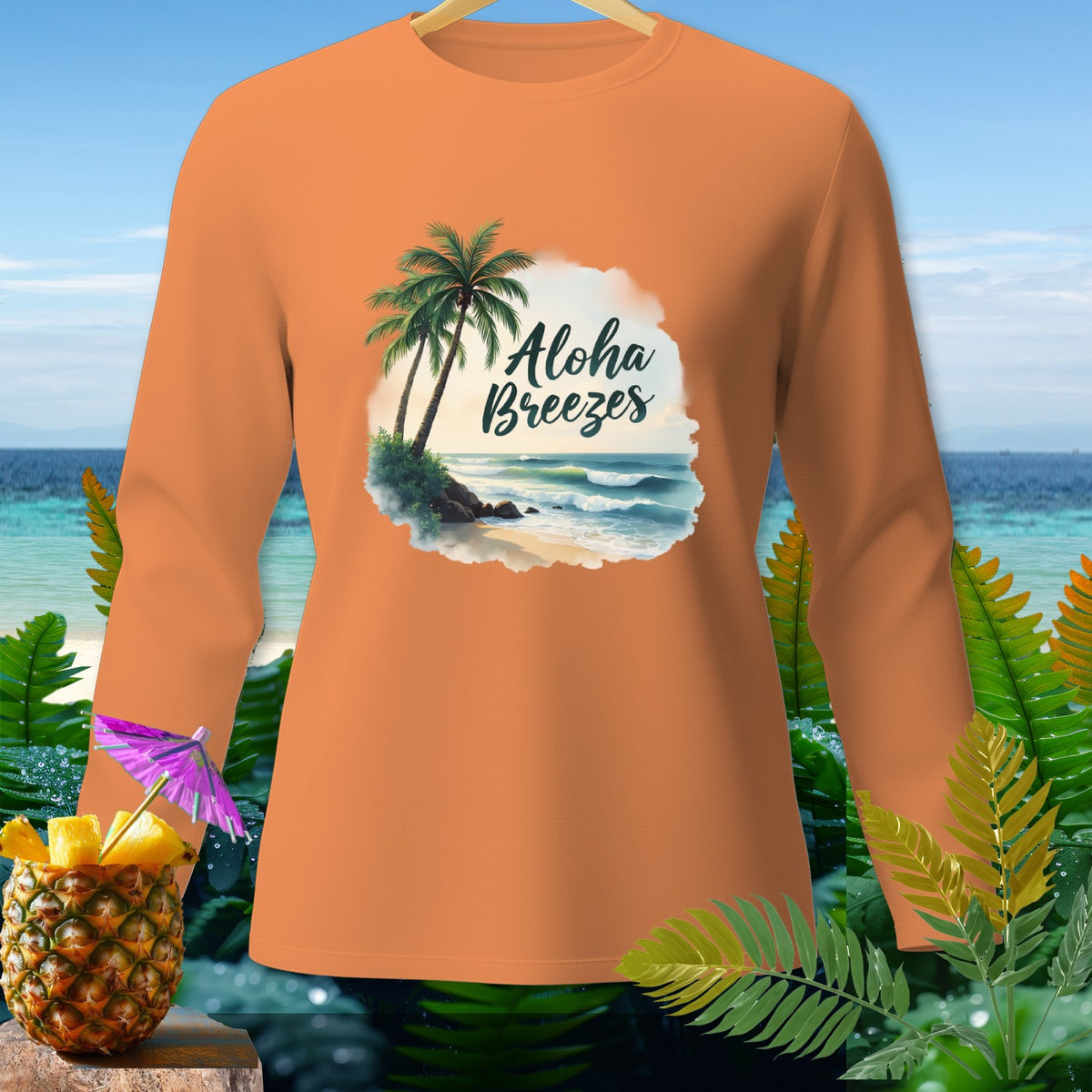Orange long-sleeve shirt with "Aloha Breezes" beach graphic and pineapple garnish.