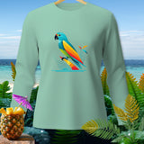 Light green long-sleeve shirt with colorful abstract parrot graphic on a beach background.