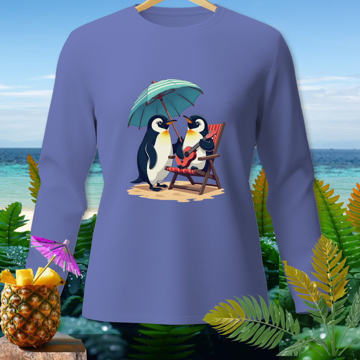 Two penguins enjoying a beach day under an umbrella with one playing a ukulele.