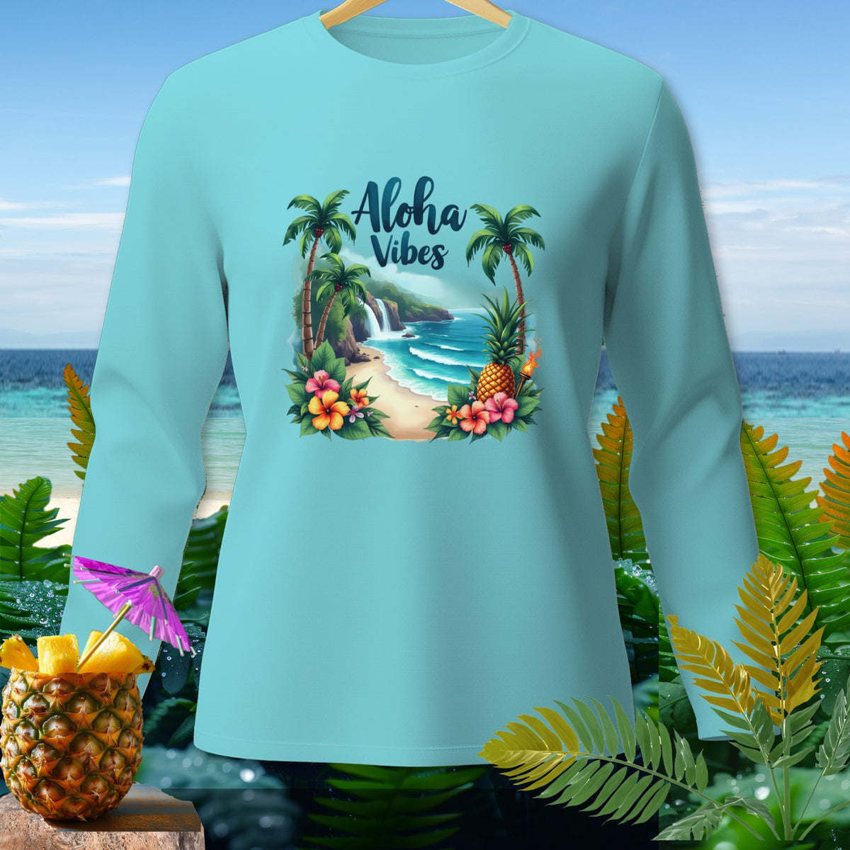 Light blue long-sleeve shirt with "Aloha Vibes" graphic of a beach scene.