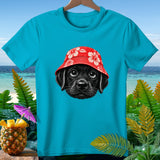Turquoise t-shirt with a black lab puppy wearing a red hibiscus bucket hat.