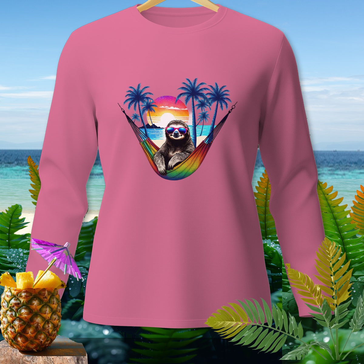Pink long-sleeve shirt with a sloth wearing sunglasses in a rainbow hammock.