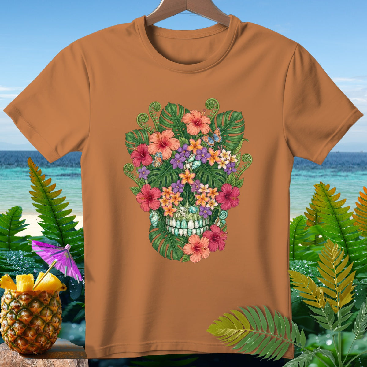 Orange t-shirt with a floral skull design featuring tropical flowers and butterflies.