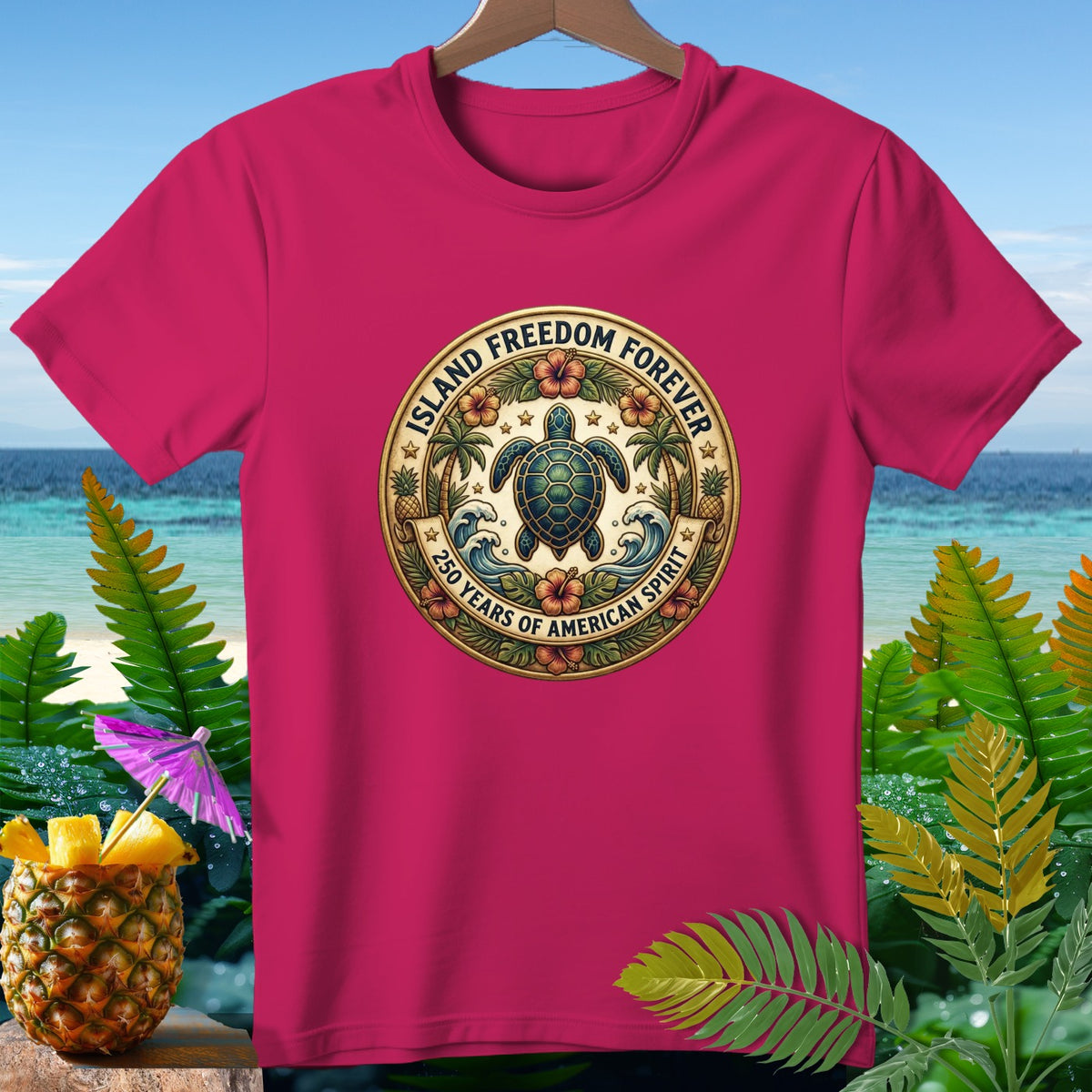 Pink t-shirt with circular emblem featuring a turtle, palm trees, waves, and text.