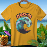 Yellow t-shirt with a wave graphic featuring ghosts and a surfer.