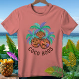 T-shirt with three jack-o'-lantern coconuts under palm trees, text 