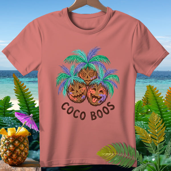 T-shirt with three jack-o'-lantern coconuts under palm trees, text "COCO BOOS".