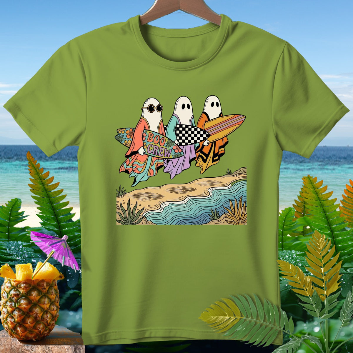 Three cartoon ghosts with surfboards walk along a beach with "Boo Crew" text.