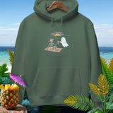 Green hoodie with skeleton and ghost on a beach blanket, text reads 