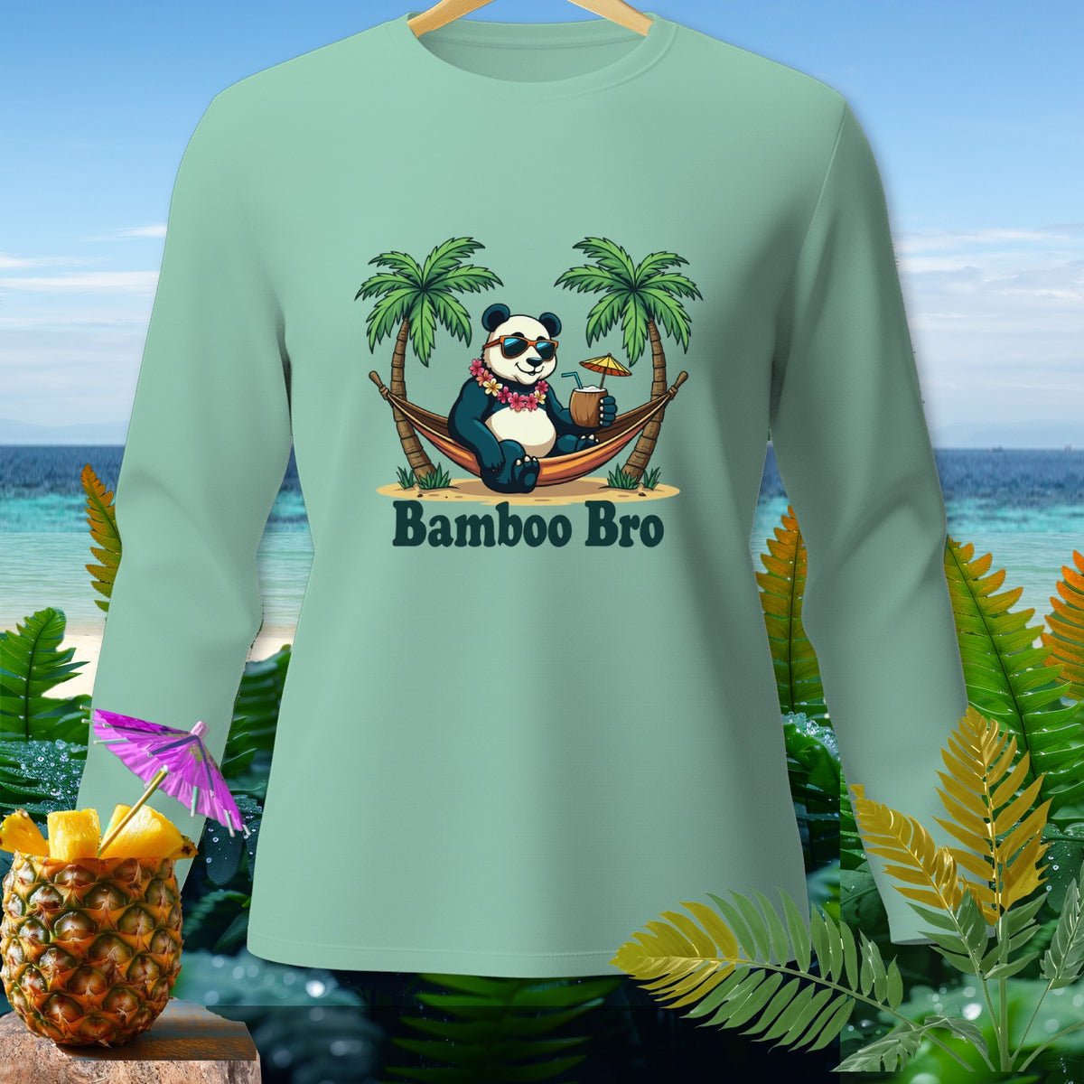 Panda in hammock with drink and text "Bamboo Bro" on a light green long-sleeve shirt.