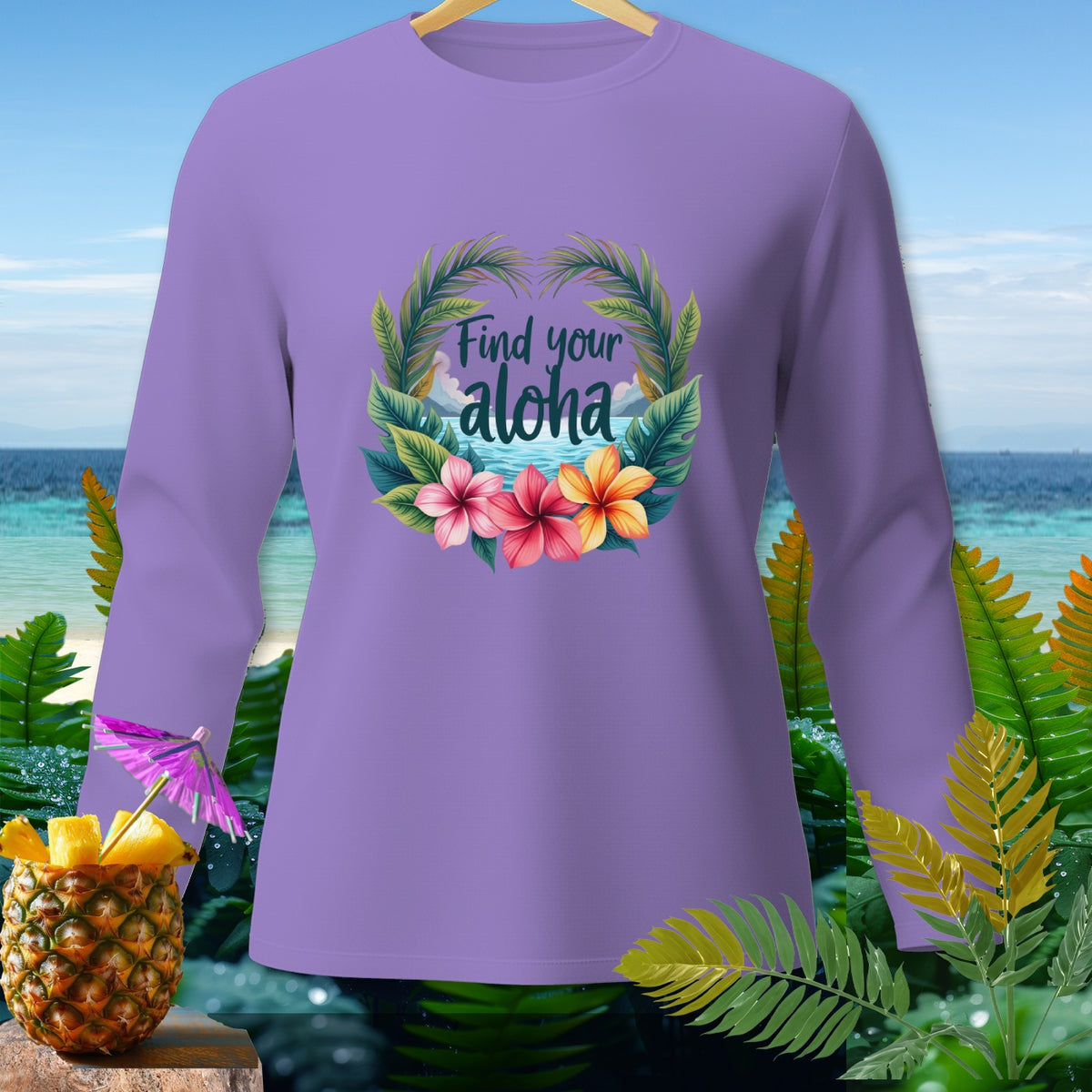 Lavender long-sleeve shirt with "Find your aloha" floral graphic and tropical background.