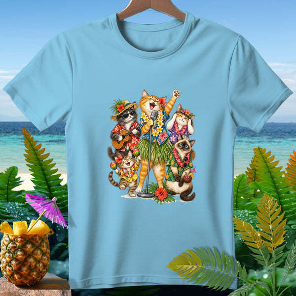 Five cats in Hawaiian attire sing and play instruments on a beach.