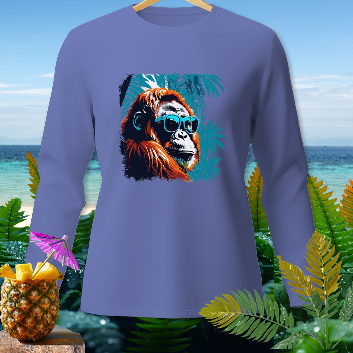 Long sleeve shirt with orangutan wearing sunglasses graphic on tropical background.