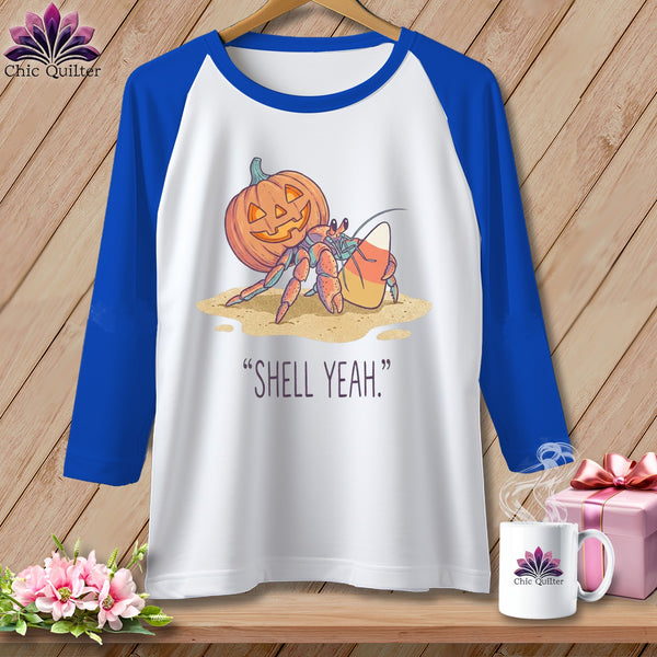 Hermit crab with pumpkin and candy corn on shirt, "Shell Yeah" text.