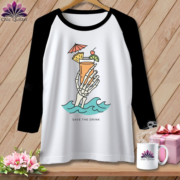 Raglan t-shirt with skeleton hand holding a cocktail, waves, and text "SAVE THE DRINK".