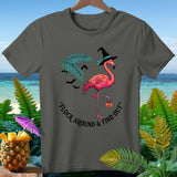 Pink flamingo in witch hat, holding pumpkin, with bats and text 