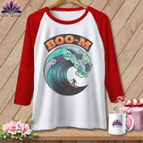 White baseball tee with red sleeves, featuring 