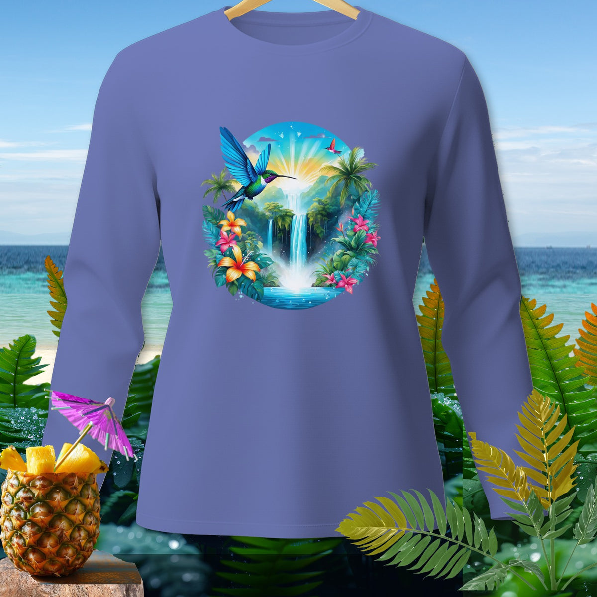 Purple long-sleeve shirt with a tropical waterfall and hummingbird graphic.