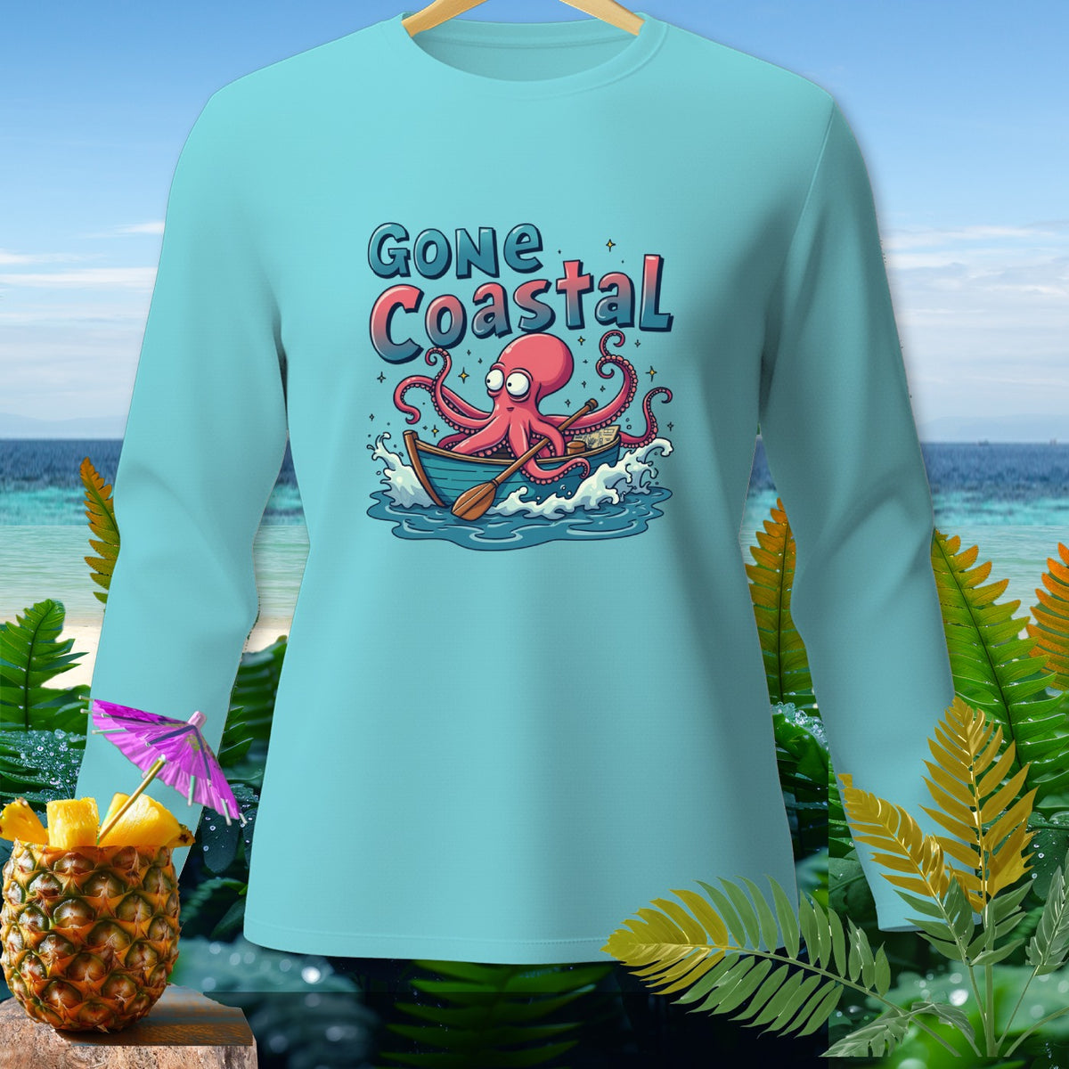 Light blue long-sleeve shirt with octopus in a boat graphic and text "GONE Coastal".