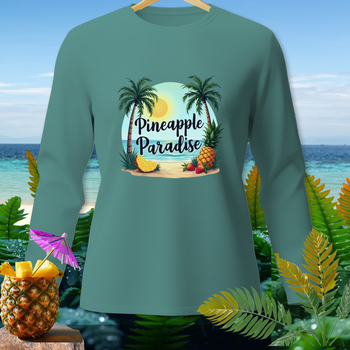 Teal long-sleeve shirt with "Pineapple Paradise" beach scene graphic.