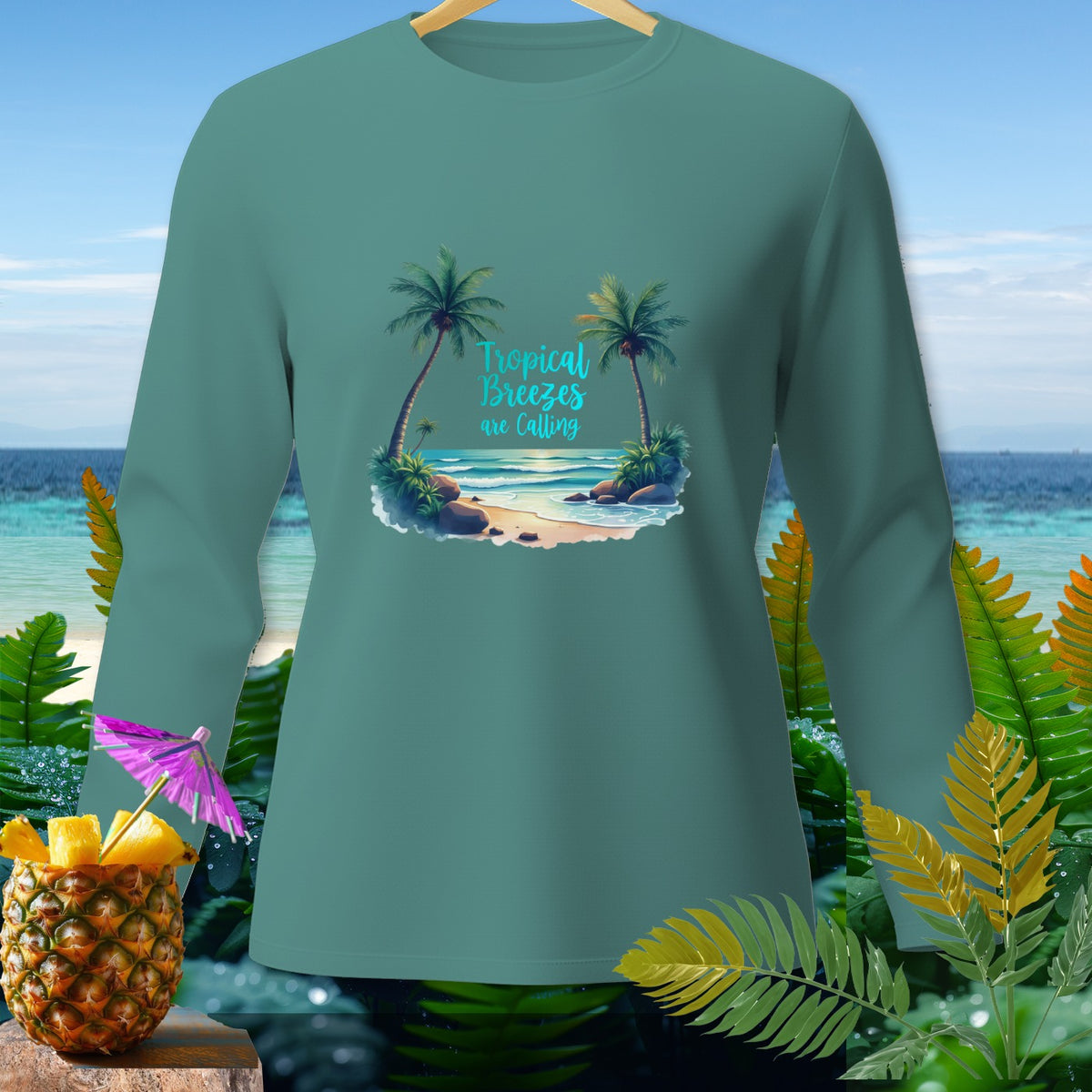 Long sleeve shirt with tropical beach graphic and text "Tropical Breezes are Calling".