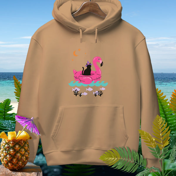 Tan hoodie with black cat on flamingo float, crescent moon and stars above.
