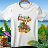 Moose wearing sunglasses sits on a beach chair with tropical birds on antlers.