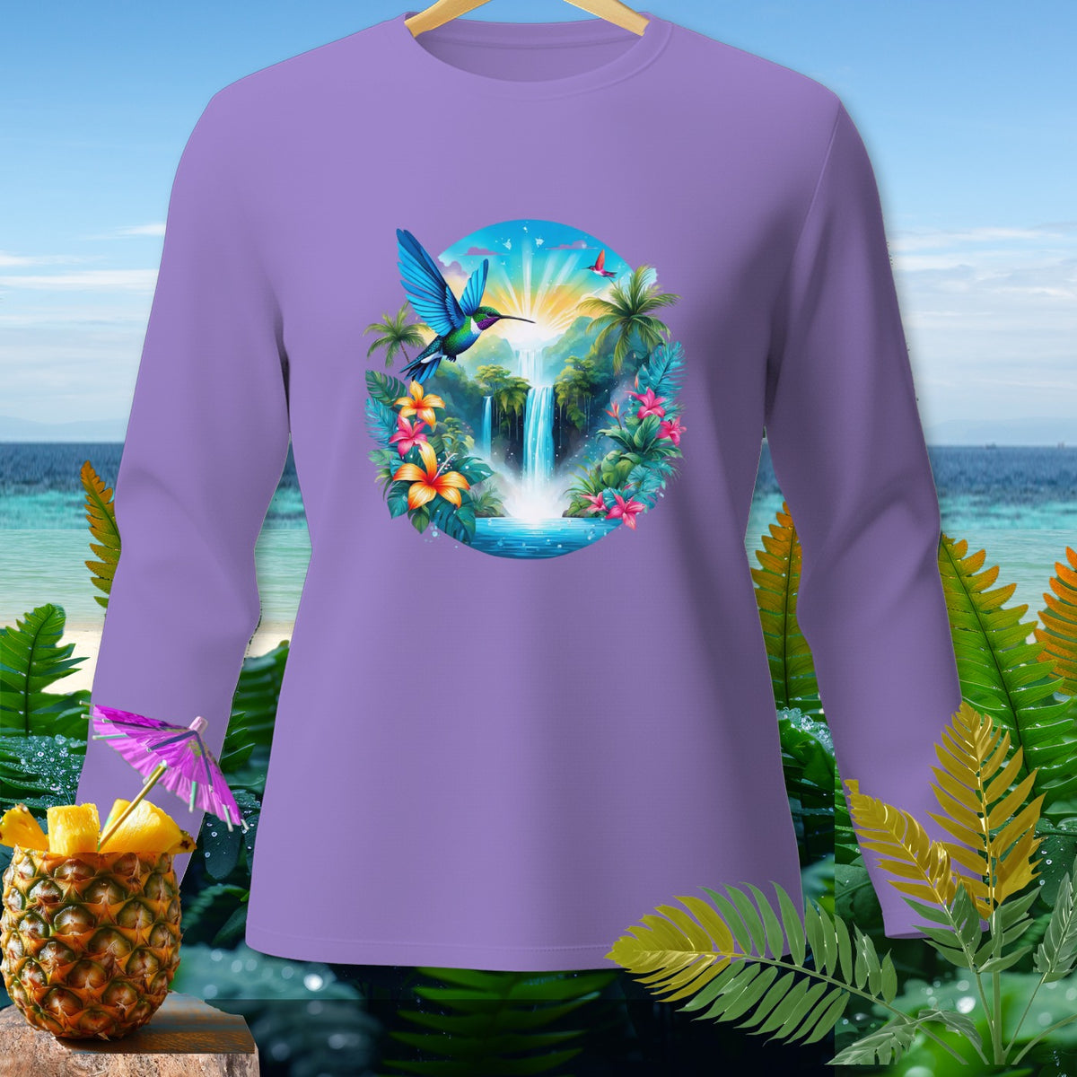Purple long-sleeve shirt with a tropical waterfall and hummingbird graphic.