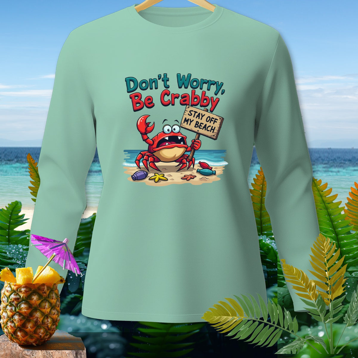 Light teal long sleeve shirt with crab holding "Stay Off My Beach" sign.