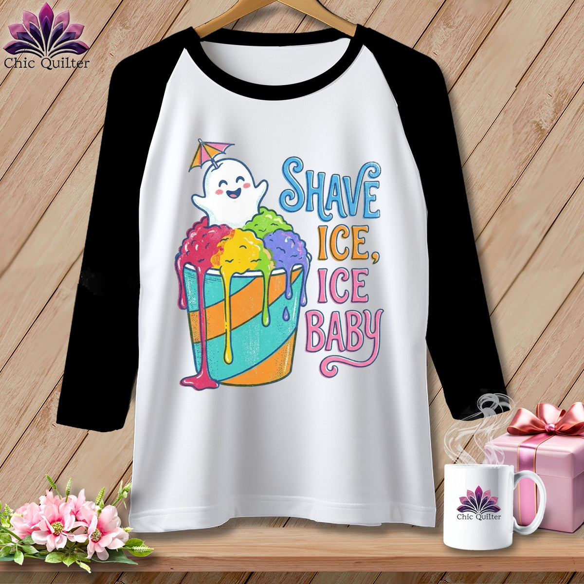 T-shirt with a ghost holding an umbrella over a cup of shave ice and "Shave Ice, Ice Baby" text.