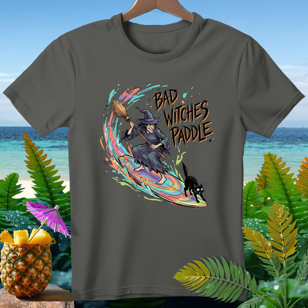 Witch surfing with black cat, text "BAD WITCHES PADDLE".